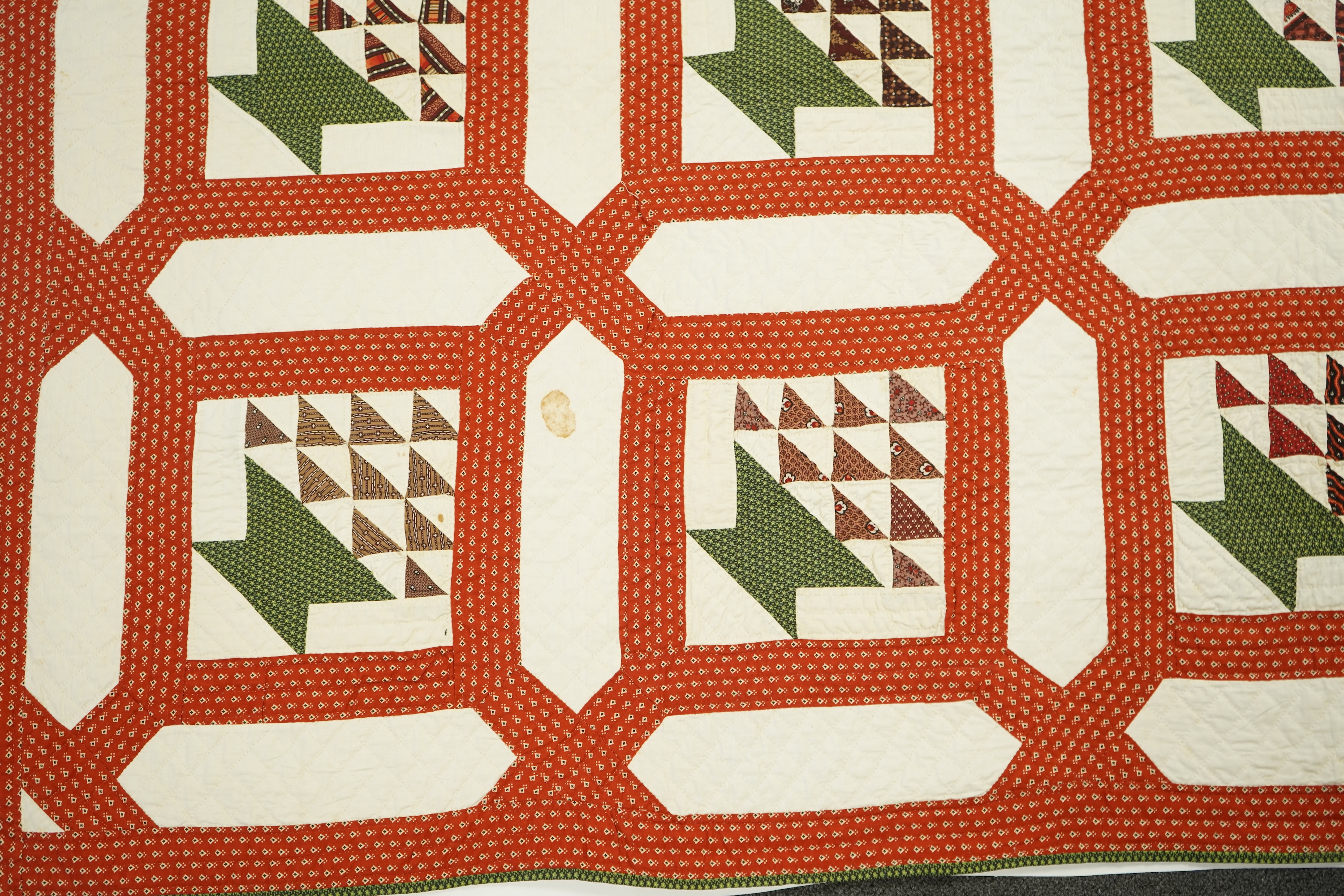 A handsome mid 19th century American ‘Basket’ hand pieced and hand quilted bed cover. An unlaundered Civil War quilt. The reverse side a printed quilted cotton. This quilt purchased in Virginia. 226cm x 168cm. Condition